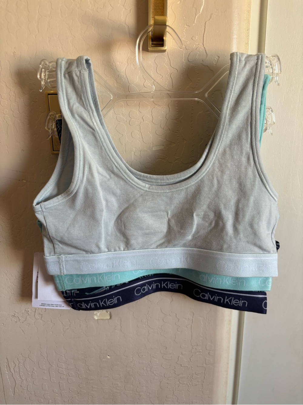 NWT Calvin Klein Navy & Aqua Logo Bralette Trio, kids Size Medium - Picture 2 of 2
